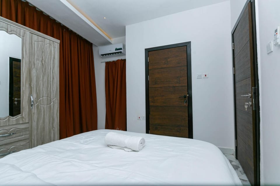 Bed, Bedroom, towels, wardrobe, air conditioner