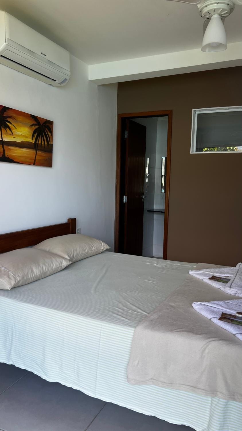 Bed, Photo of the whole room, Bedroom, towels, air conditioner
