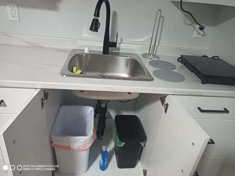 Kitchen or kitchenette, stove