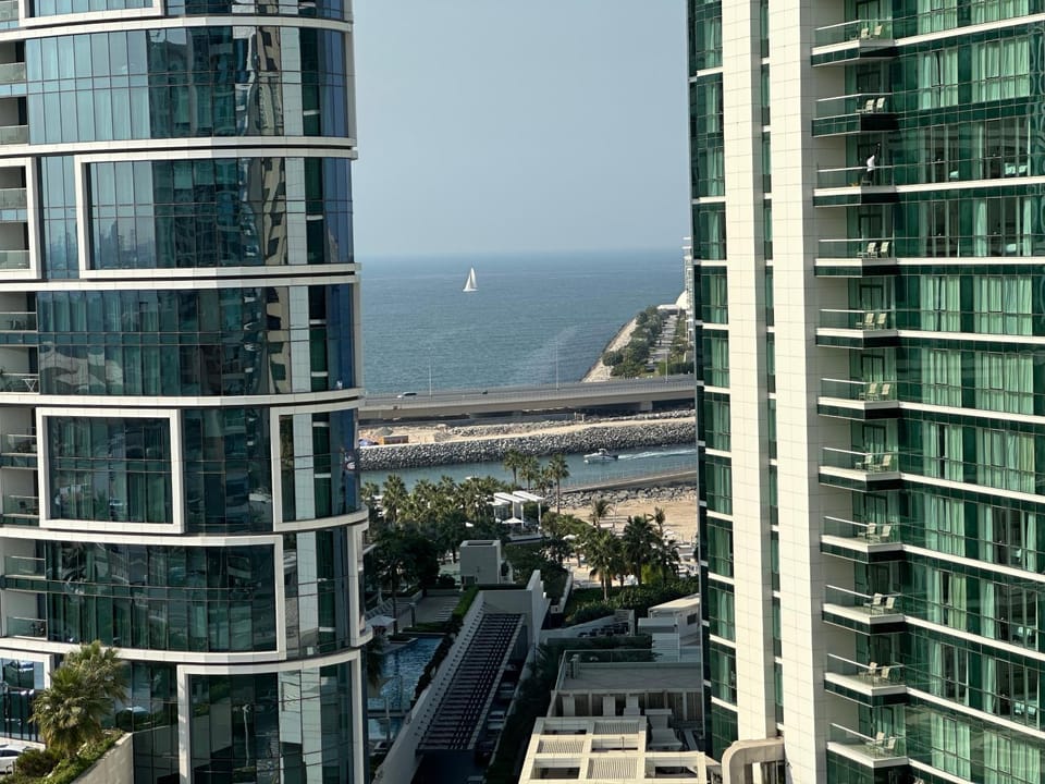Property building, Day, Natural landscape, Bird's eye view, Beach, Beach, City view, Sea view