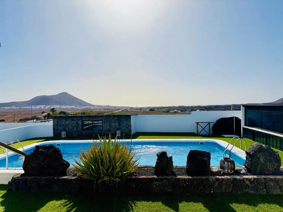 Facade/entrance, Day, Natural landscape, Lobby or reception, Mountain view, Pool view, Swimming pool