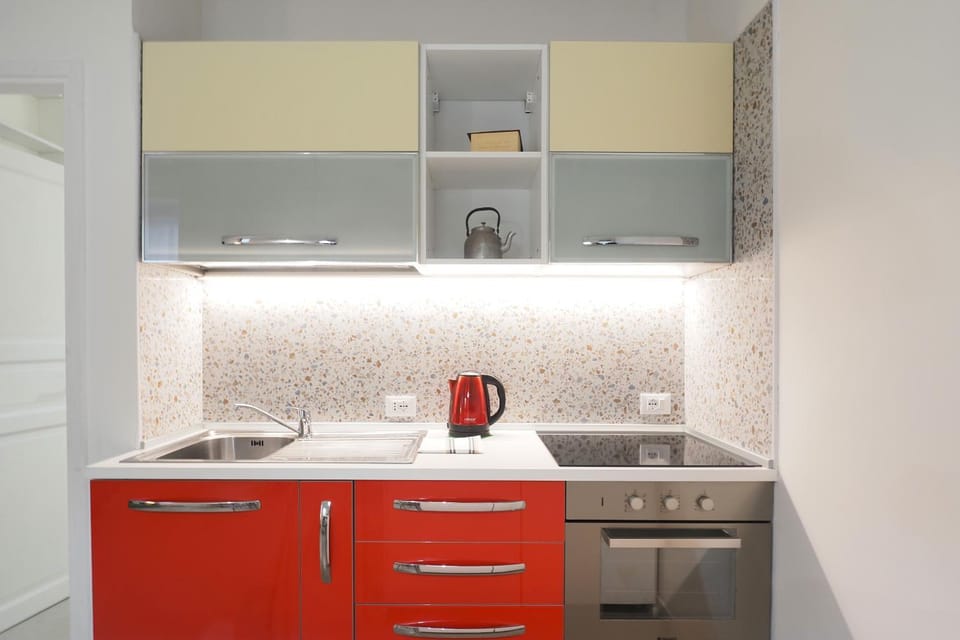 Kitchen or kitchenette, stove