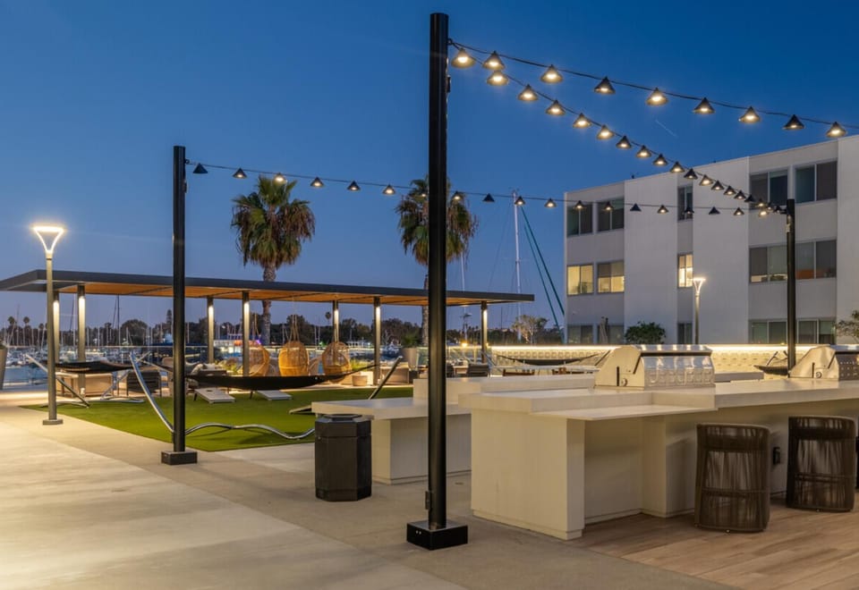 Property building, Patio, Night, BBQ facilities, City view, Sea view