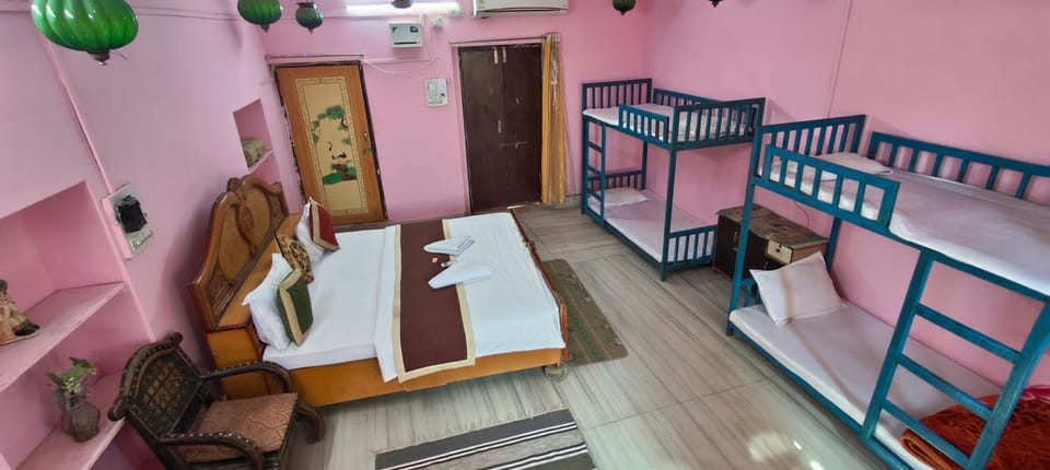 Bed, Photo of the whole room, Seating area, bunk bed, air conditioner