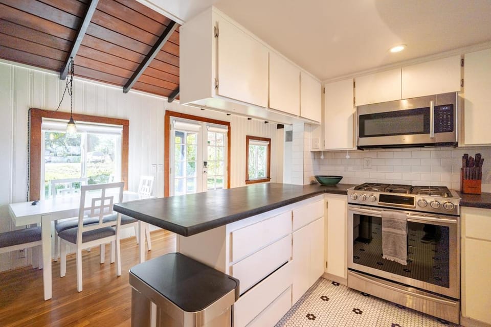 Kitchen or kitchenette, dishwasher, oven, stove, toaster