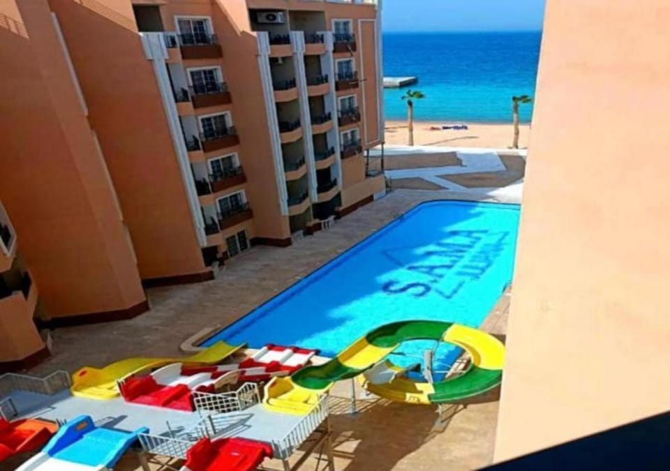 Property building, Day, Aqua park, Pool view, Swimming pool, Swimming pool