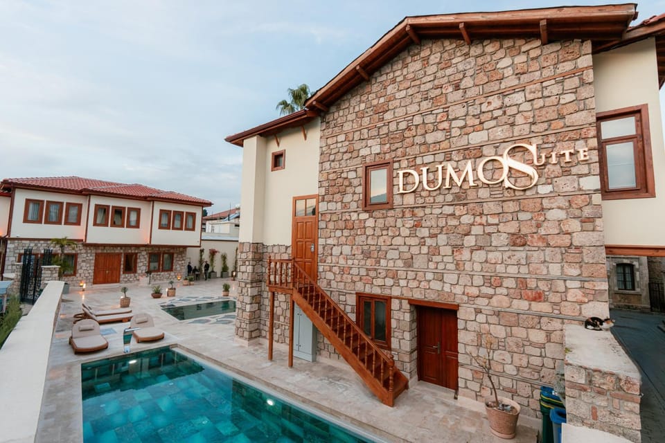 Property building, Day, Property logo or sign, Pool view, Swimming pool, sunbed