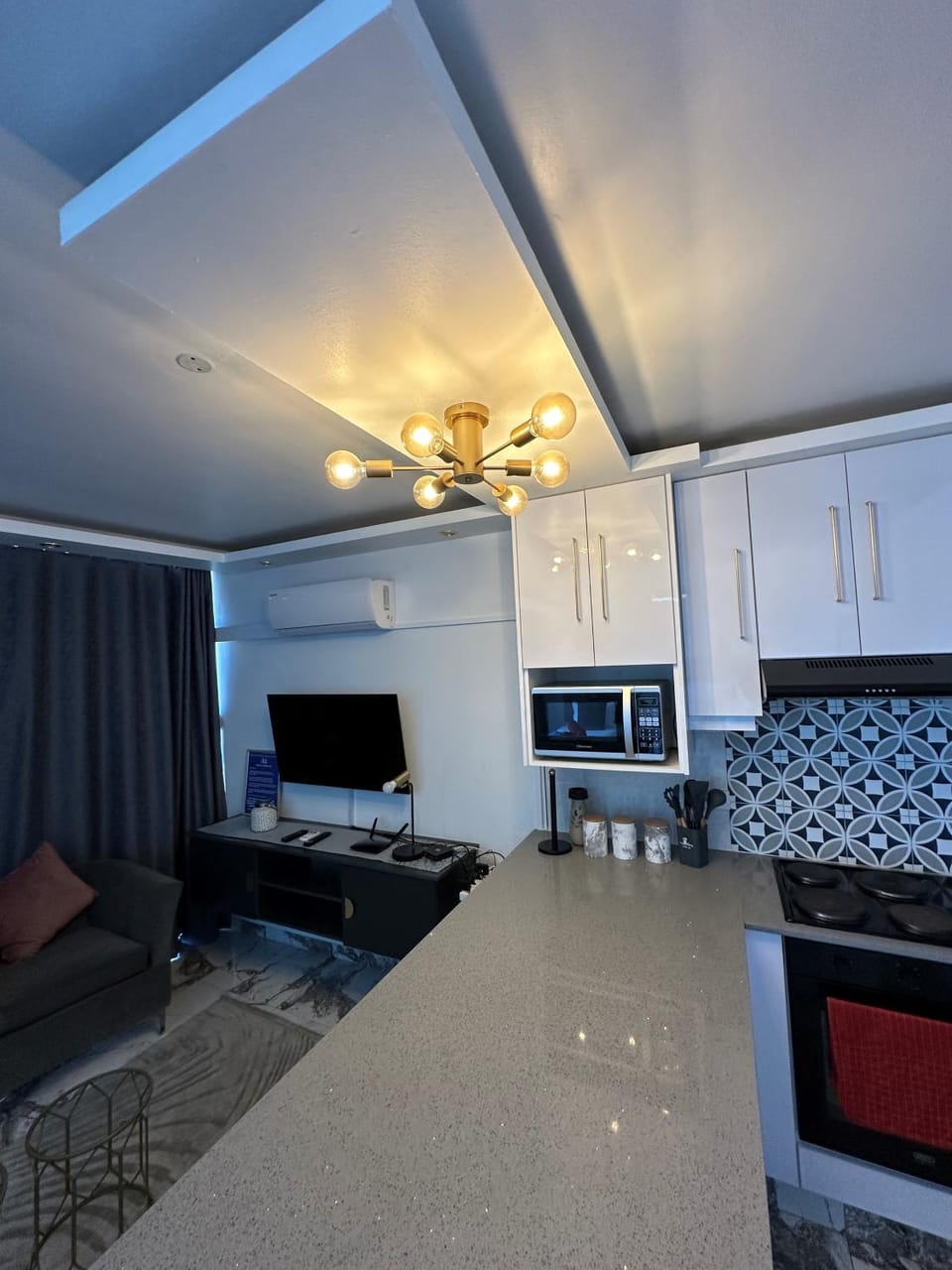 Kitchen or kitchenette, Living room, stove