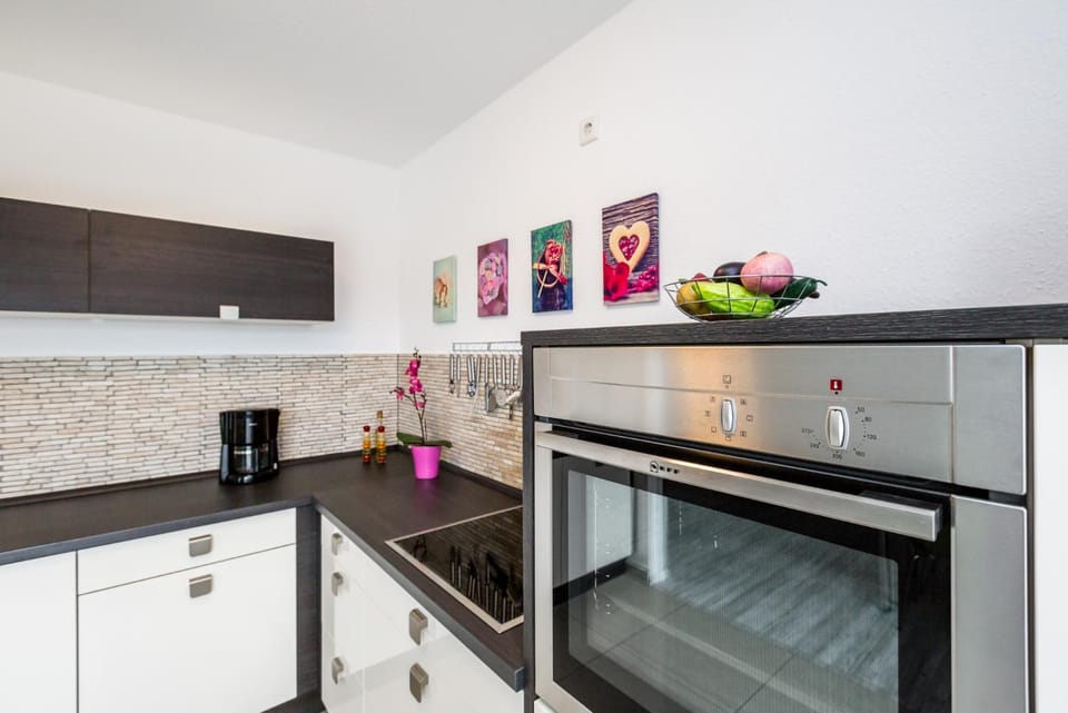 Kitchen or kitchenette, oven, stove