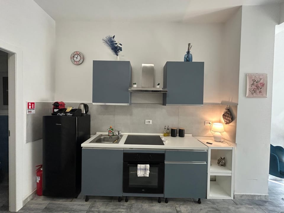 Kitchen or kitchenette, oven, stove
