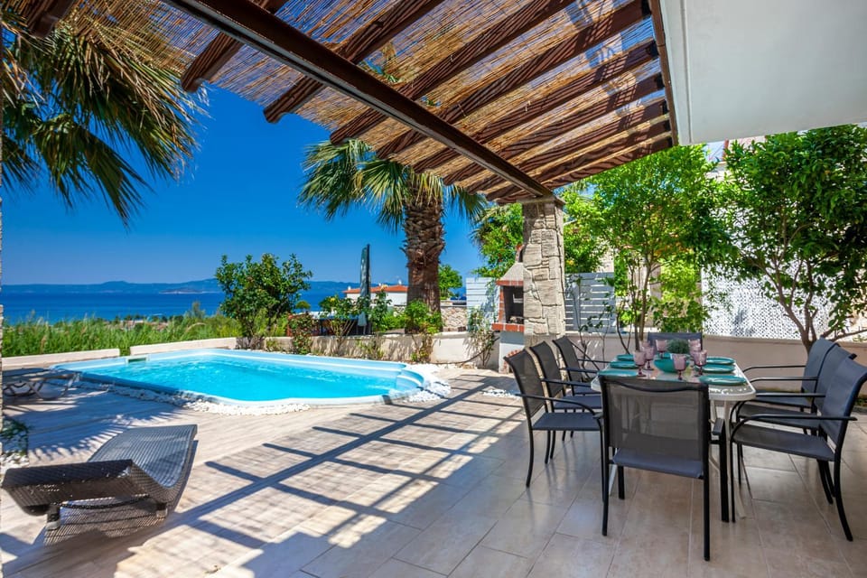 Patio, Day, Natural landscape, View (from property/room), Balcony/Terrace, Living room, Seating area, Dining area, Pool view, Sea view, Swimming pool