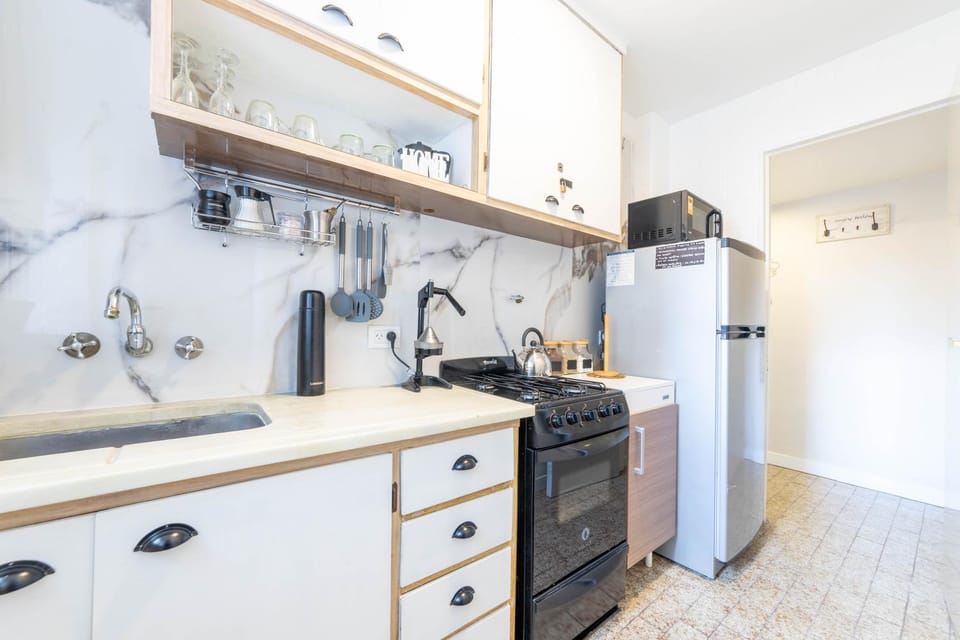 Kitchen or kitchenette, oven