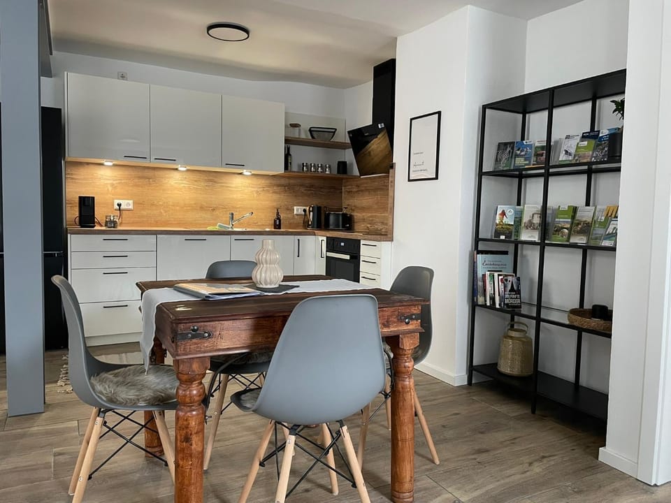 Kitchen or kitchenette, Seating area, Dining area, dishwasher, oven, stove