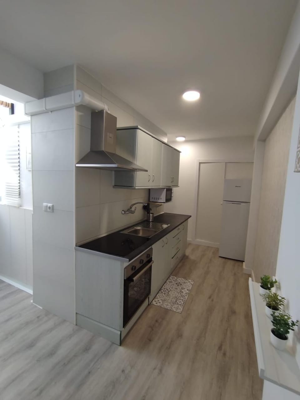 Kitchen or kitchenette, oven