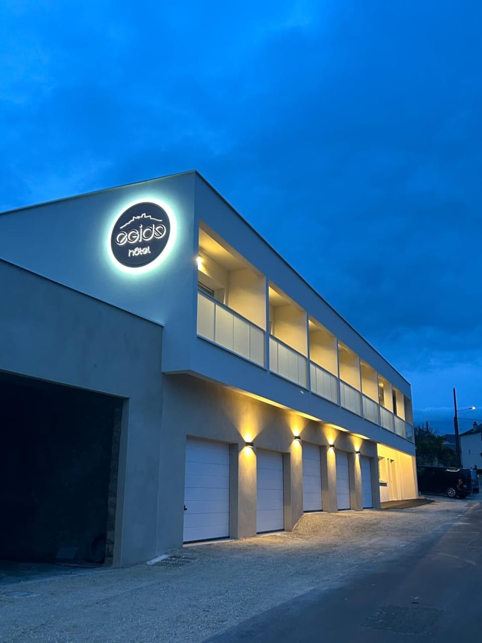 Property building, Night, Property logo or sign, Parking