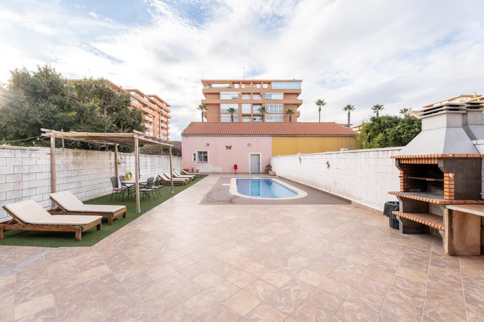 Property building, Living room, Swimming pool
