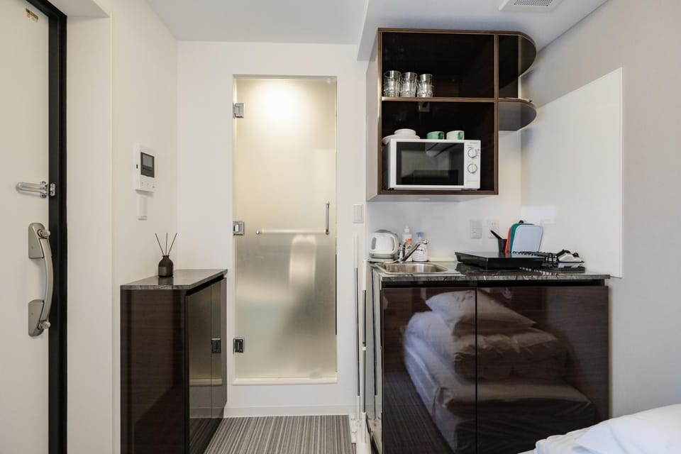 Kitchen or kitchenette, microwave