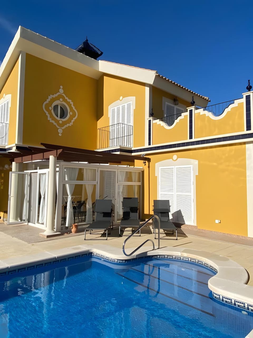 Property building, Living room, Swimming pool
