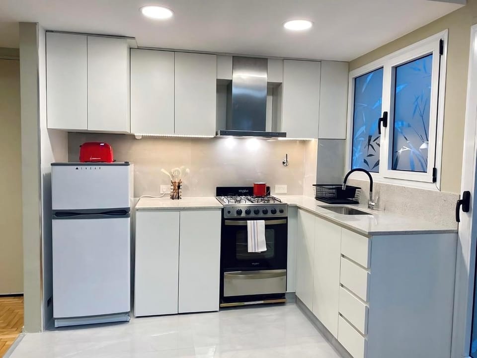 Kitchen or kitchenette, oven, toaster