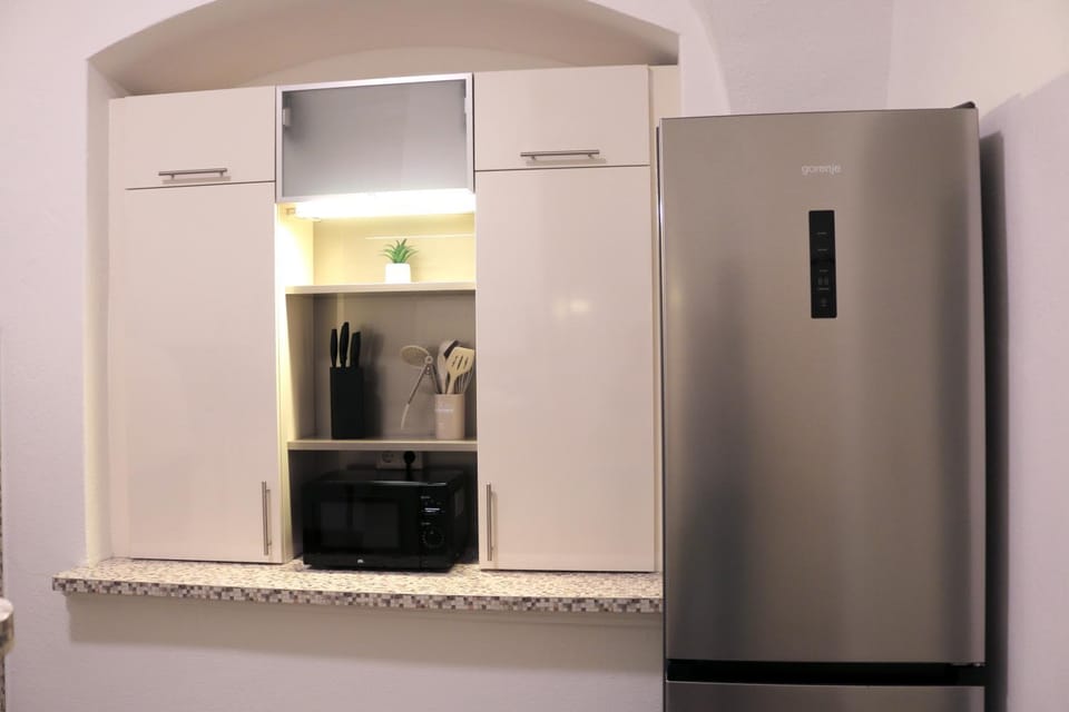 Kitchen or kitchenette, microwave