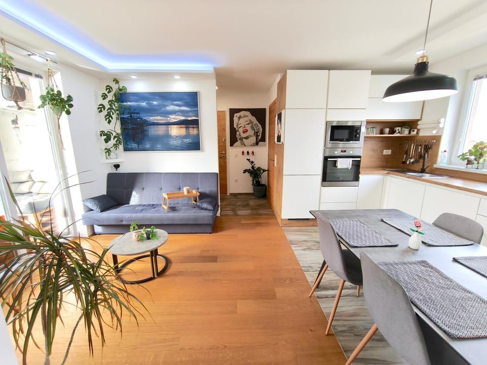 Living room, Seating area, Dining area, microwave, oven, kitchen