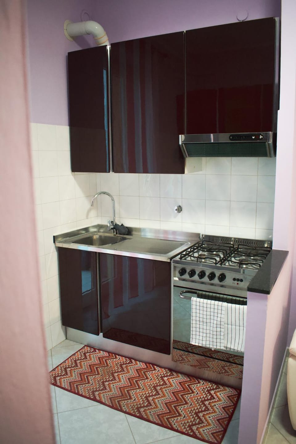 Kitchen or kitchenette, oven, stove