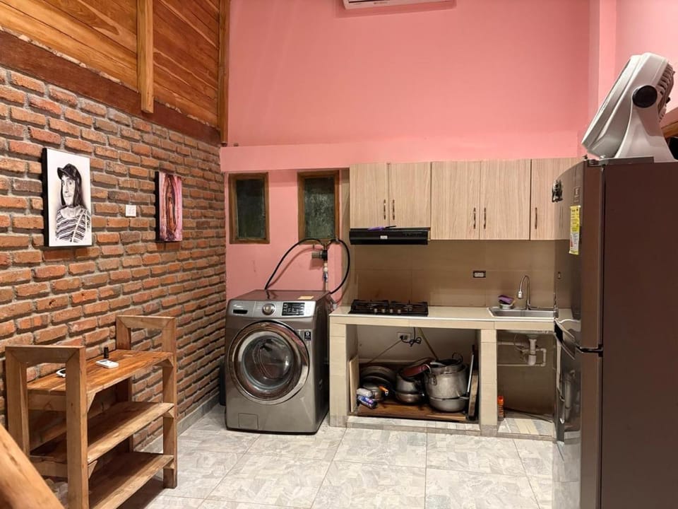 Kitchen or kitchenette, washing machine
