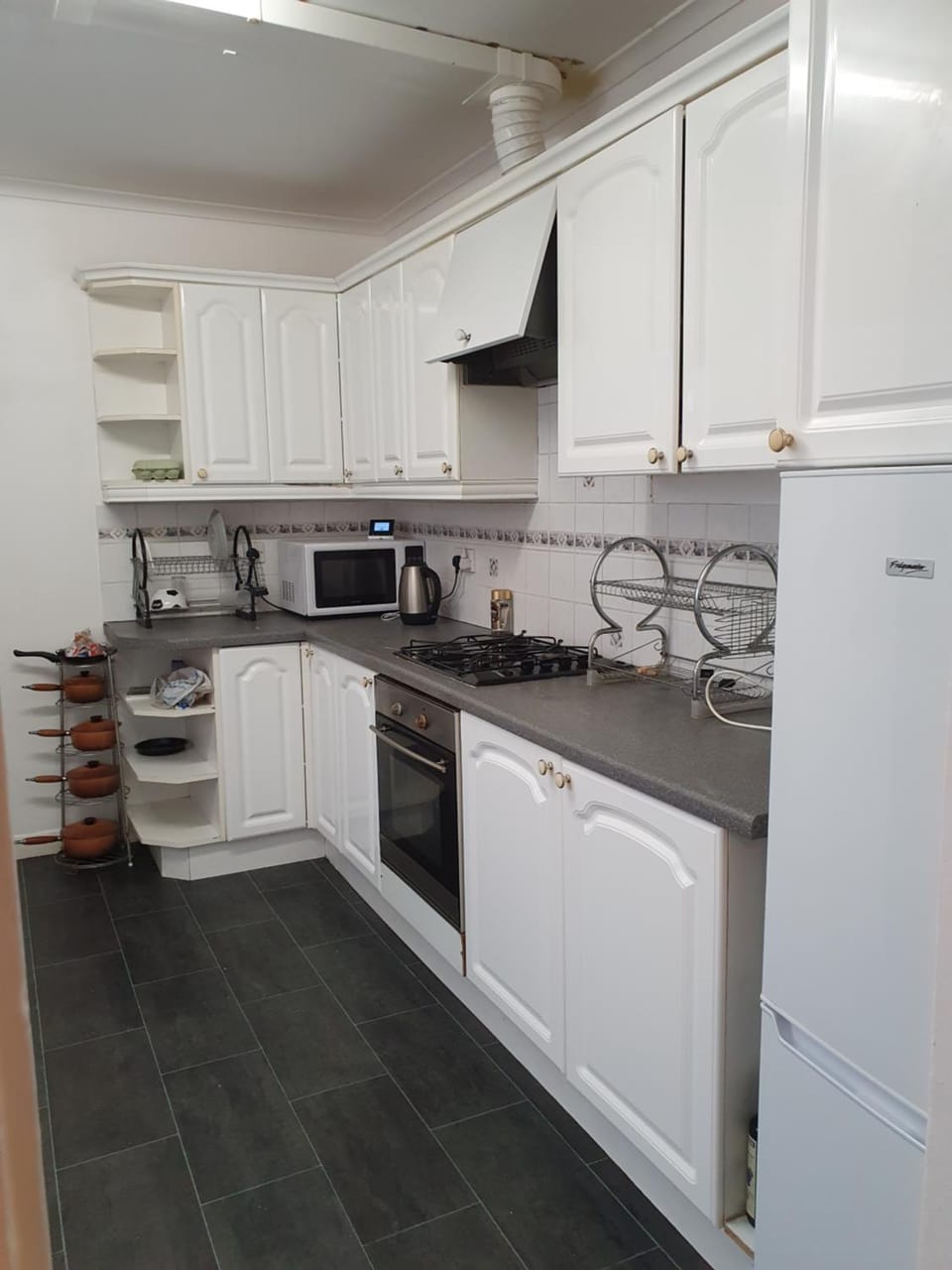 Kitchen or kitchenette, oven, toaster