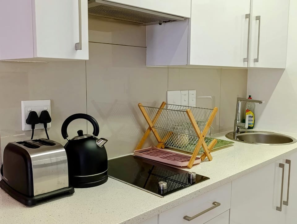 Kitchen or kitchenette, stove, toaster