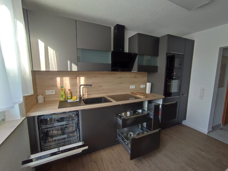 Kitchen or kitchenette, oven, stove