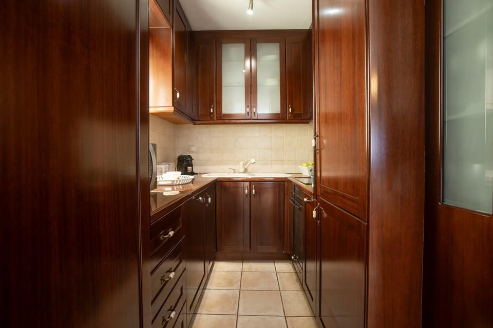 Kitchen or kitchenette, oven, stove