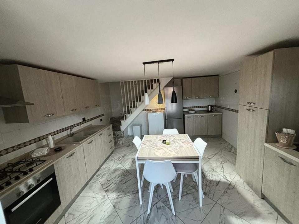 Dining area, dishwasher, oven, stove