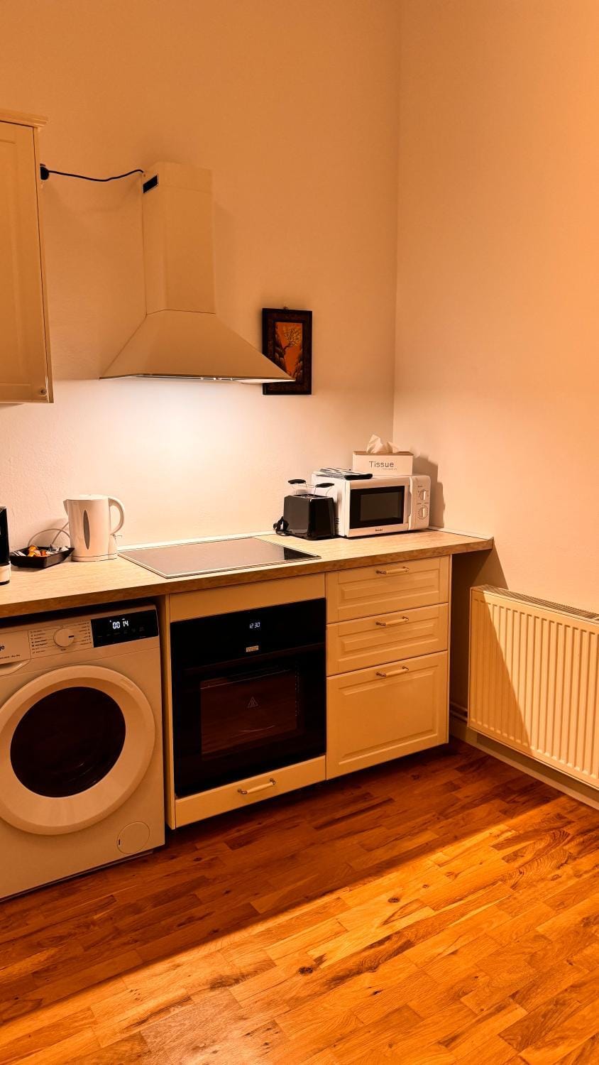 Kitchen or kitchenette, microwave, oven