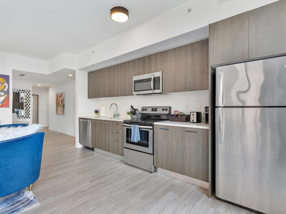 Kitchen or kitchenette, dishwasher, oven, stove, toaster