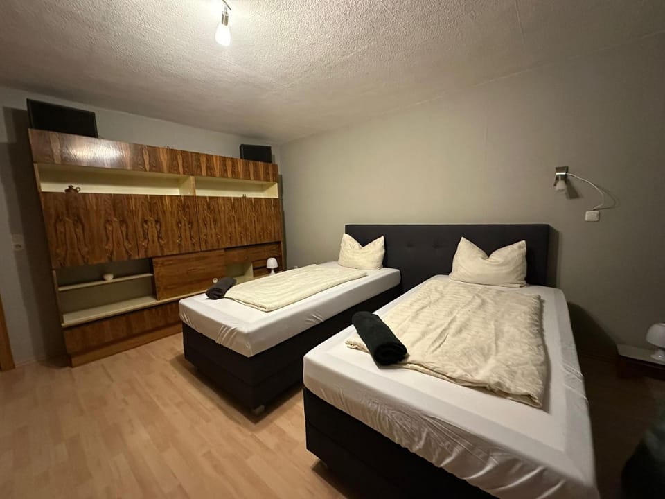 Bed, Photo of the whole room, Decorative detail, Bedroom, storage, towels