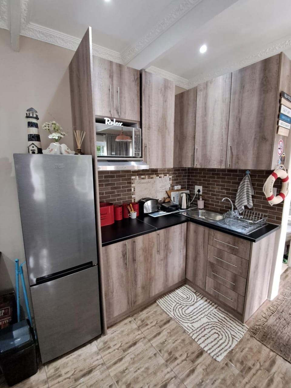 Kitchen or kitchenette, oven, stove, toaster