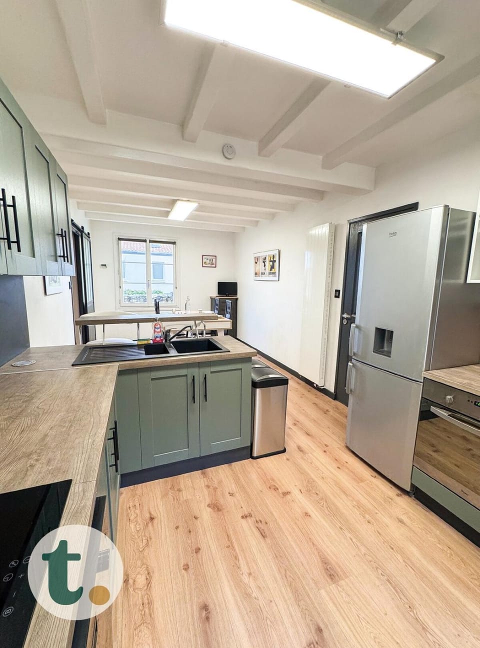 Kitchen or kitchenette, dishwasher, oven, stove