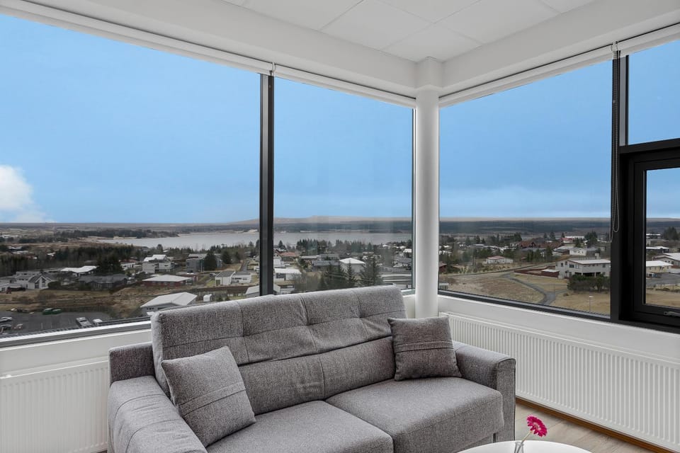 Natural landscape, View (from property/room), Living room, Seating area, Lake view