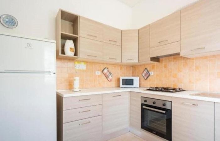 Kitchen or kitchenette, oven, stove