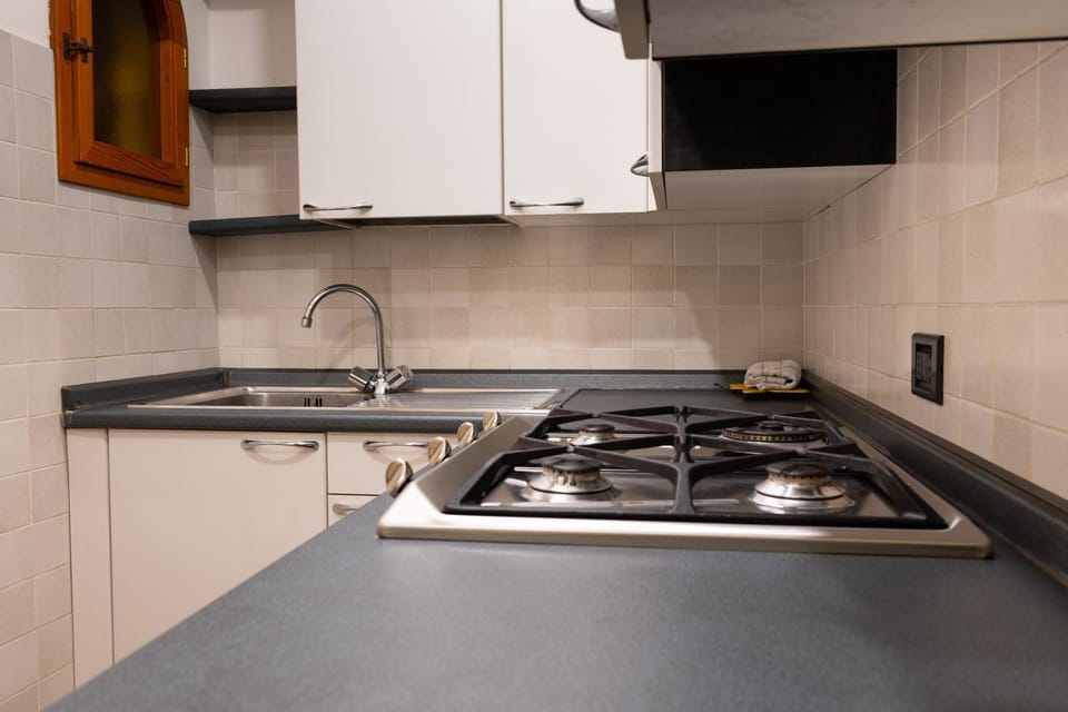 Kitchen or kitchenette, stove