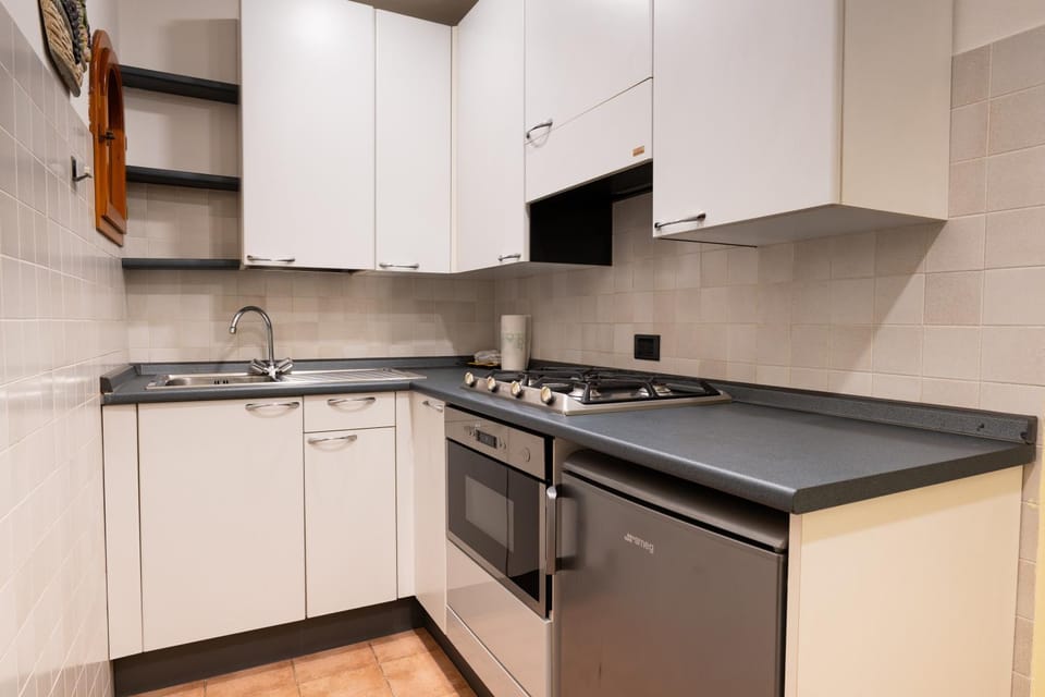 Kitchen or kitchenette, oven, stove