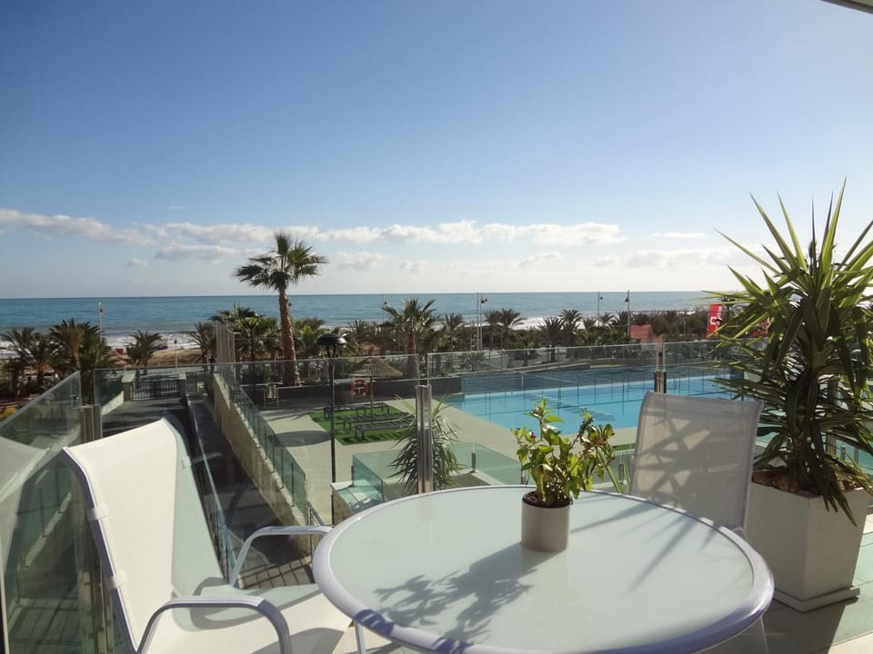 View (from property/room), Balcony/Terrace, Pool view, Sea view, Swimming pool