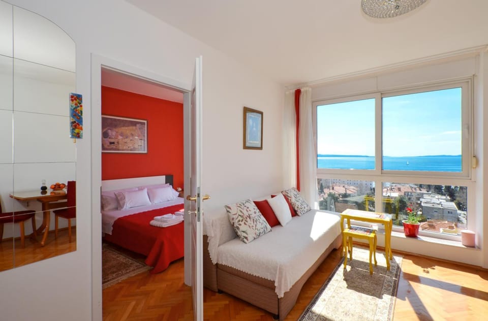 View (from property/room), Living room, Seating area, Bedroom, Sea view