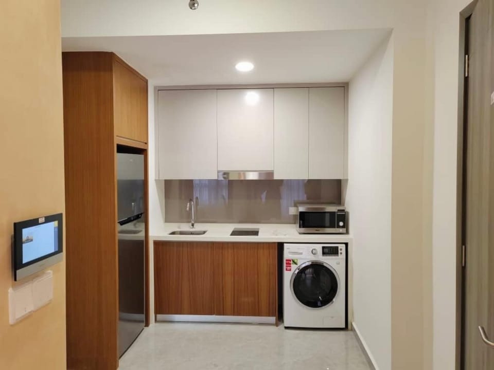 Kitchen or kitchenette, washing machine