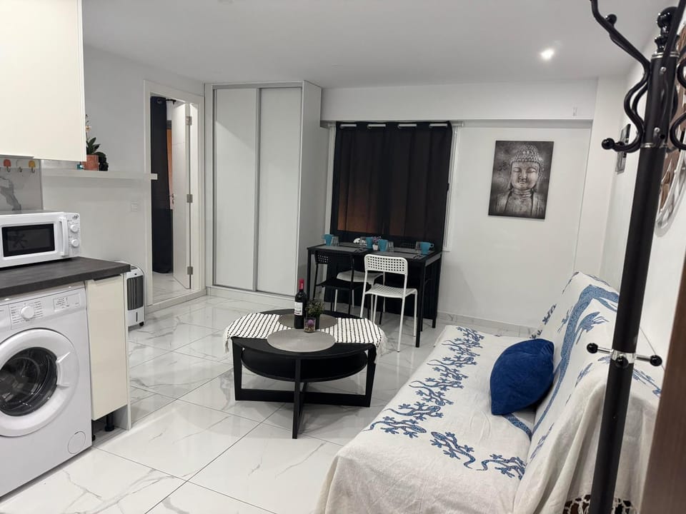 Photo of the whole room, Seating area, washing machine, air conditioner