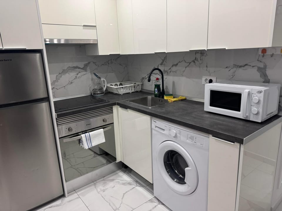 Kitchen or kitchenette, oven, stove