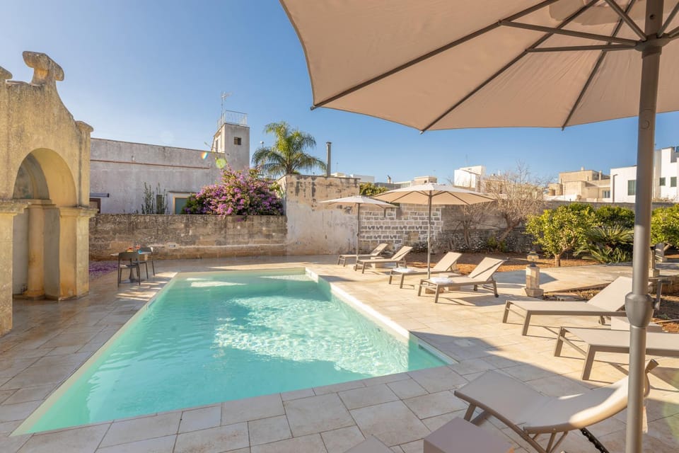 Property building, Day, Natural landscape, Pool view, sunbed