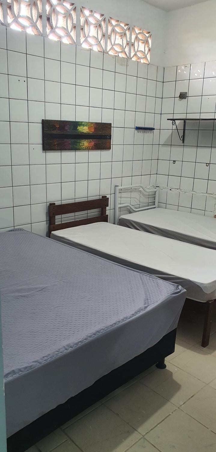 Quarto com cozinha funcional Vacation rental in Guarapari