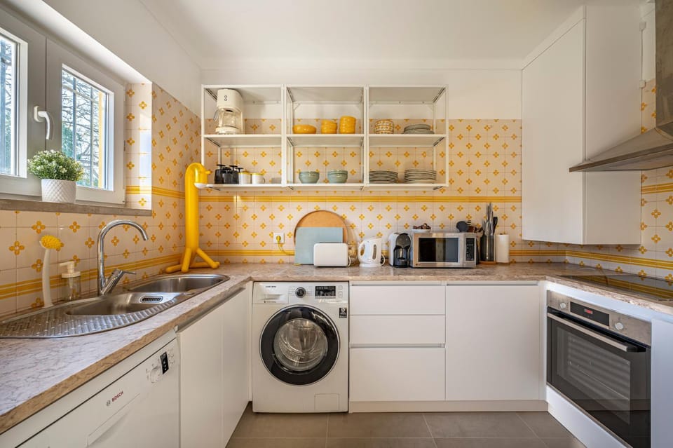 Kitchen or kitchenette, washing machine