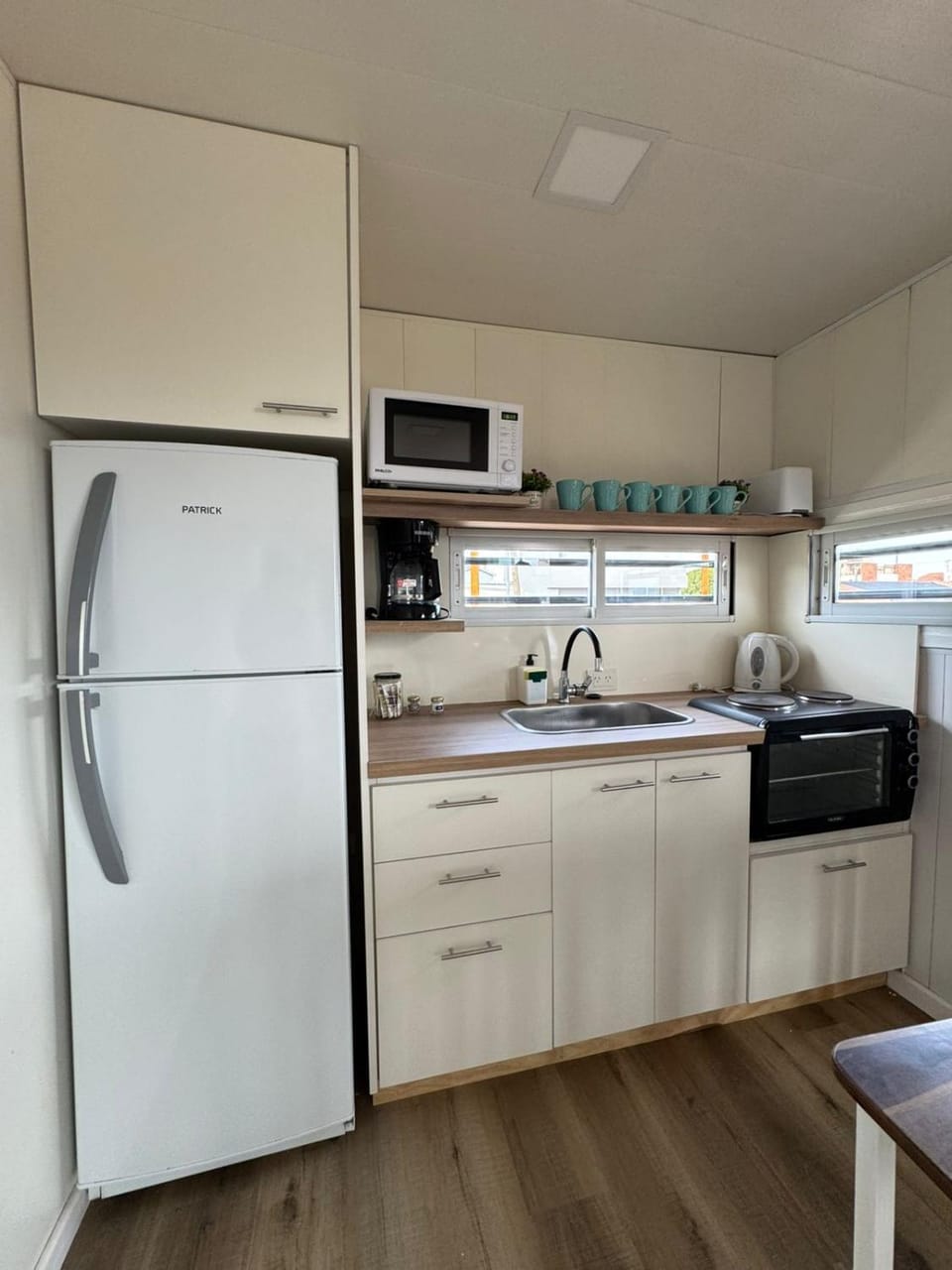 Kitchen or kitchenette, oven, stove, toaster